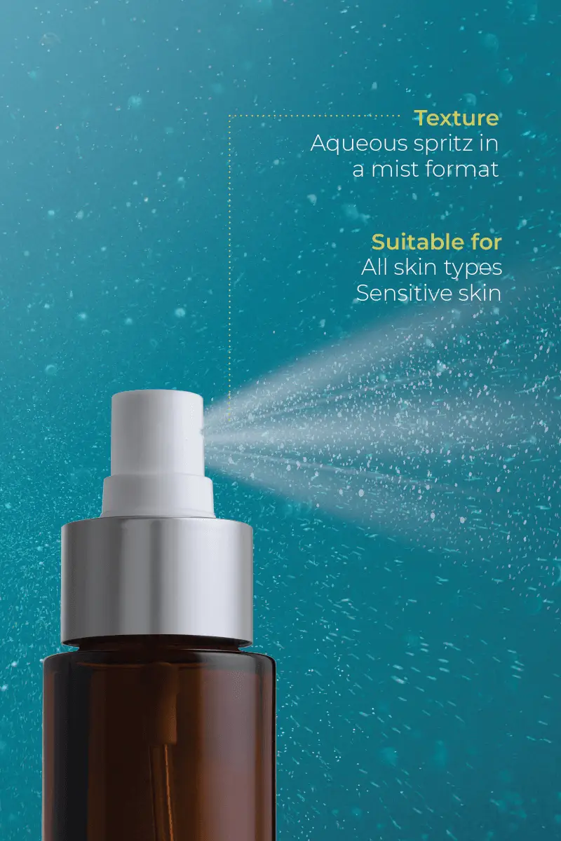 A brown bottle of Live Probiotic Mist emits a fine mist against a blue background, described as an aqueous spritz suitable for all skin types, including sensitive skin.