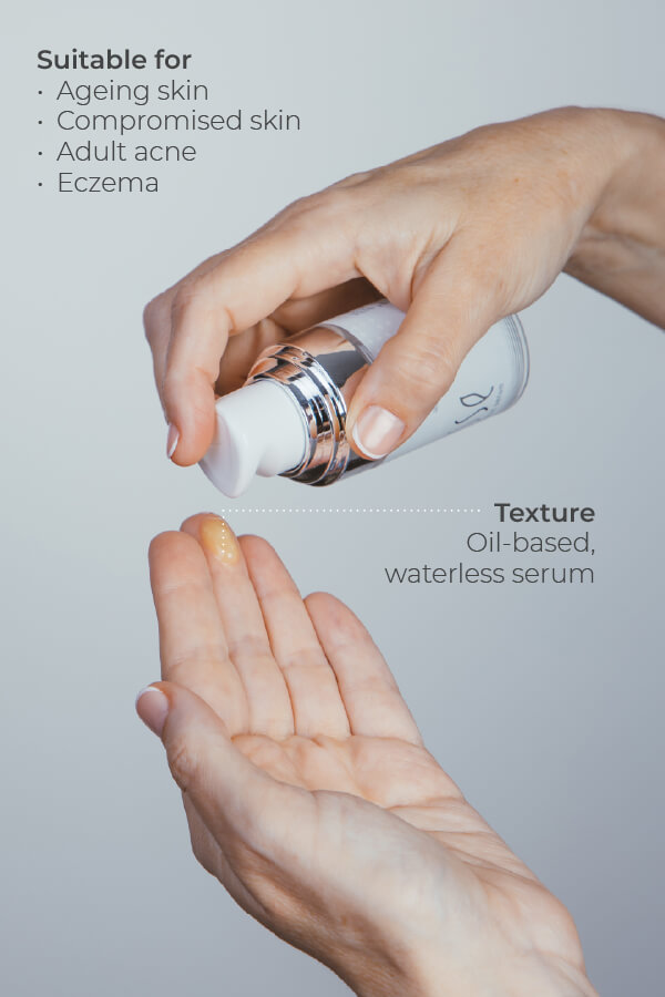 A hand dispenses Esse Probiotic Serum, an oil-based, waterless formula, from a pump bottle onto the other palm. It's suitable for ageing skin, compromised skin, adult acne, and eczema.